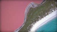 A clear landscape of aquamarine waters and squeaky white beaches